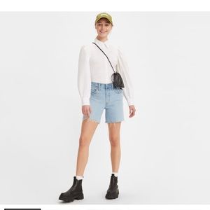 Levi’s 501 mid thigh short in samba tango crushed